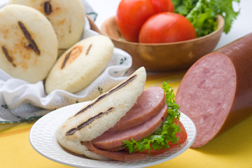 Arepas with ham, lettuce and tomato
