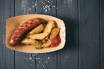 Roasted meat and vegetables taco wooden background. Mexican cuisine snacks, fast food of commercial kitchen