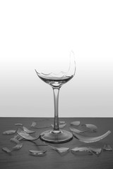 Broken Glass glass with shrapnel glass on the stone floor.