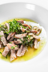 marinated pork with garlic and coriander olive oil gourmet tapas