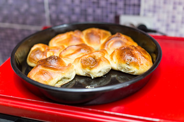 Hot samsa with lamb on the surface of the electric stove