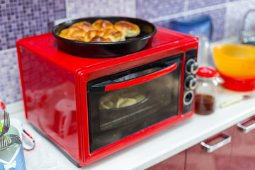 Hot samsa with lamb on the surface of the electric stove