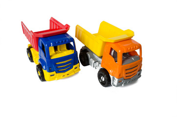 toy cars on a white isolated background. Trucks with a body. Truck toy cars