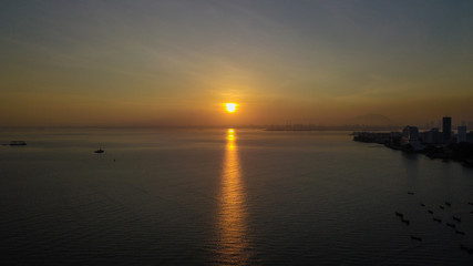 aerial view of sunrise in Penang Malaysia near the beach