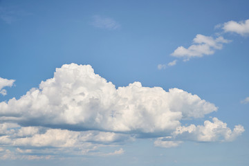 Naklejka na ściany i meble Blue sky background with tiny clouds. For collage