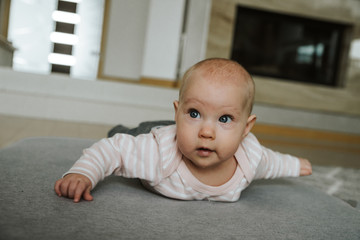 Newborn girl on the floor