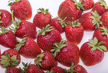 fresh ripe strawberries isolated on white background
