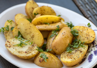  potatoes with herbs sprinkled with green parsley
