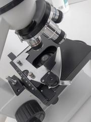 microscope, examining samples and liquid. technical equipment