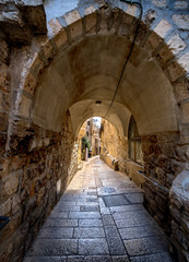 Obraz premium Ancient narrow street in old city of Jerusalem, Israel
