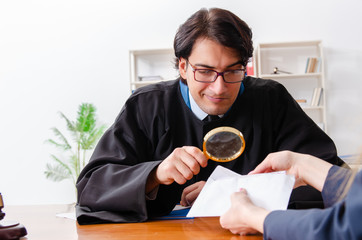 Young woman visiting male lawyer 
