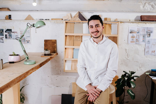 Environmental Portrait Of A Furniture Designer Maker In His Workshop