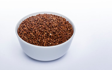 Buckwheat seeds isolated on white background