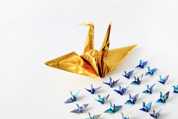 Fototapeta premium Leadership Gold paper bird object concept isolated on white background