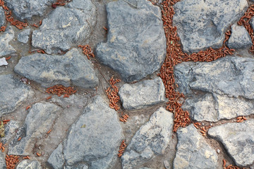 stone background. cobblestone pavement