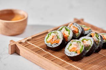 Korean roll Gimbap(kimbob) made from steamed white rice (bap) and various other ingredients