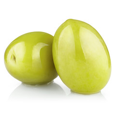 Two delicious green olives, isolated on white background
