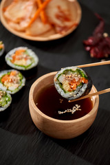 Korean roll Gimbap(kimbob) made from steamed white rice (bap) and various other ingredients