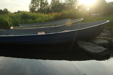 old pella boats on the lake in the sun