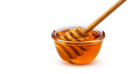 Honey stick and bowl of honey isolated on white background with clipping path