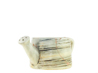 glued broken ceramic watering can on an isolated white background front view