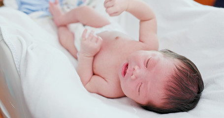 Obraz na płótnie Canvas Asian new born baby