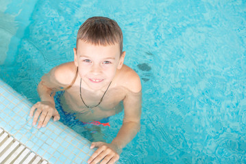 little boy in swimming pool