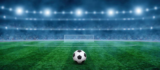 Soccer ball on green stadium © Alekss