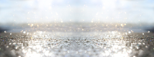 glitter silver and gild lights background. de-focused