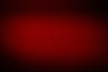 Blurred textural cloud of red color on a dark background