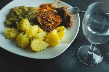 lamb chops with potatoes and salad