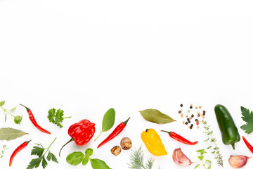 Spice herbal leaves and chili pepper on white background. Vegetables pattern. Floral and vegetables on white background. Top view, flat lay.