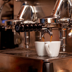 Italian expresso machine with two cups.