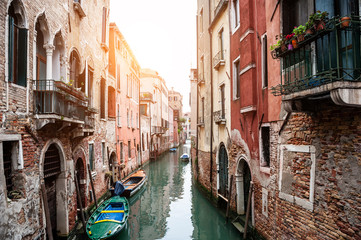 Fototapeta na wymiar Scenic canal with old architecture in Venice, Italy.