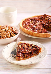 Nut and caramel tart, served