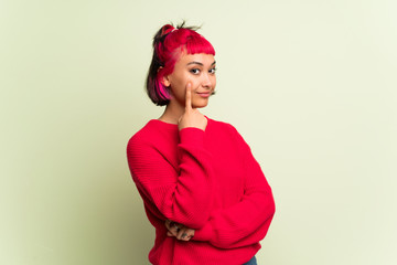 Young woman with red sweater looking to the front