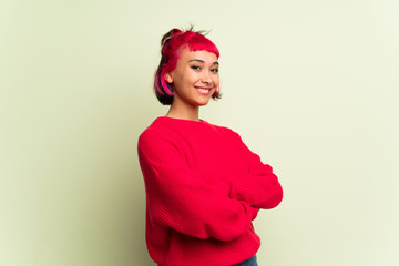 Young woman with red sweater smiling