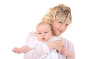 cheerful beautiful young woman holding baby in hands