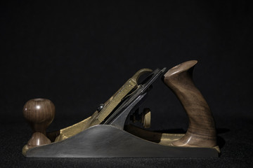 hand plane on a black background