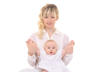 cheerful beautiful young woman holding baby in hands