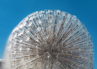 Dandelion form park water fountain - Powered by Adobe