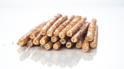 Sesame sticks on a white background