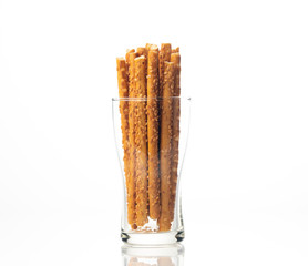 Sesame sticks on a white background