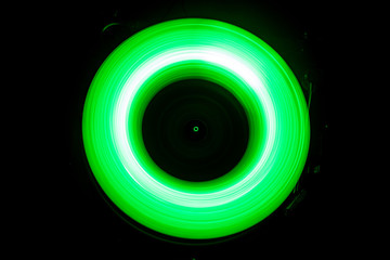 Concept of speed - Trail of fire and smoke - Vinyl record. Burning vinyl disk. Turntable vinyl record player. Retro audio equipment for disc jockey. Sound technology