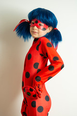 Corby, United Kingdom. March 12, 2019 - little girl in Ladybug Myraculous cosplay costume....