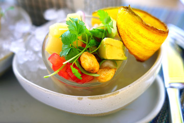 Dish of raw fish ceviche on ice