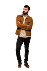 Fototapeta premium Handsome man with beard with confuse face expression over isolated white background