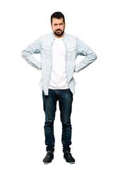 Full-length shot of Handsome man with beard angry over isolated white background