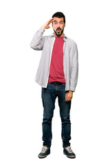 Full-length shot of Handsome man with beard has just realized something and has intending the solution over isolated white background