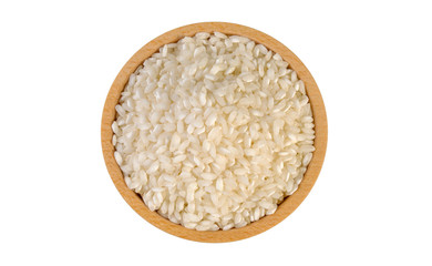 arborio risotto short grain rice in wooden bowl isolated on white background. nutrition. food ingredient.